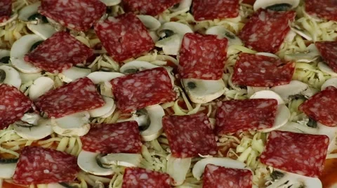 Putting tomatoes on pizza Stock Footage 52487769