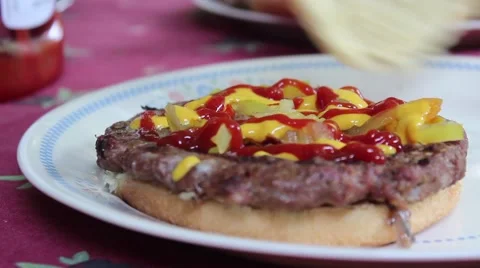 Putting Top Bun On Hamburger Stock Footage 52671272