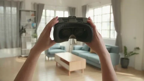 Putting On Virtual Reality Headset 스톡 동영상 155397709