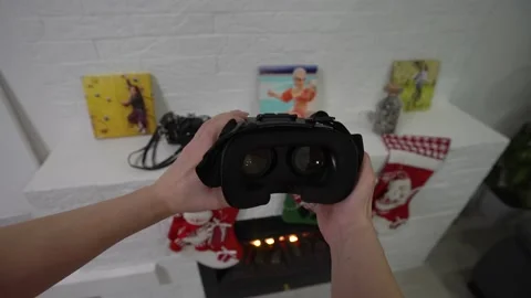 Putting on VR glasses Virtual Reality point of view taking of VR glasses Stock Footage 145150214