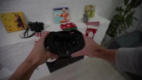 Putting on VR glasses Virtual Reality point of view taking of VR glasses Stock Footage 145150271