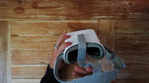 Putting on VR glasses Virtual Reality point of view taking of VR glasses Video stock 243245313