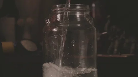 Putting Water To Jar Stock Footage 79218544