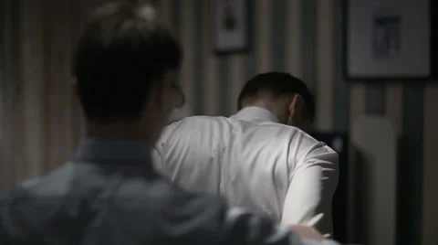 Putting on wedding jacket. Stock Footage 33128537