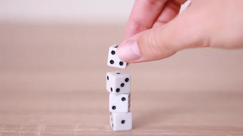 Putting white dice in column Vídeo Stock 98480294