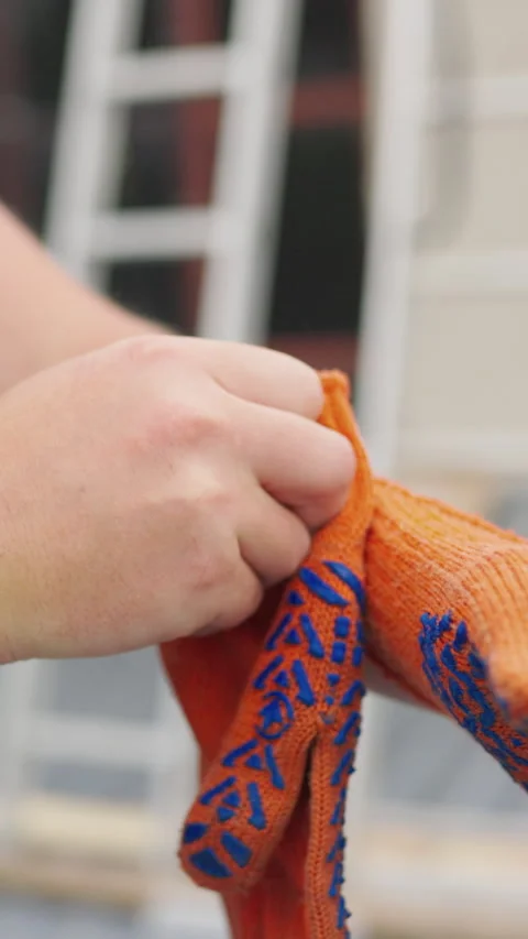 Putting on Work Gloves Stock Footage 319592727