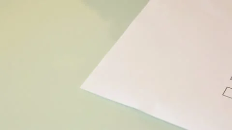 Putting an x on a voting sheet Stock Footage 11422732