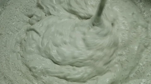 Putty mixing. plaster mixing Stock Footage 146379789