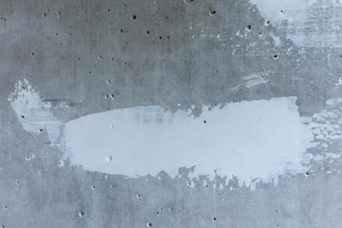 Puttying the wall with white putty Stock Photos