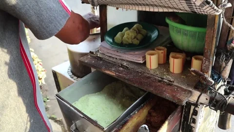 Putu, Indonesian traditional cake Stockbeeldmateriaal 243738020