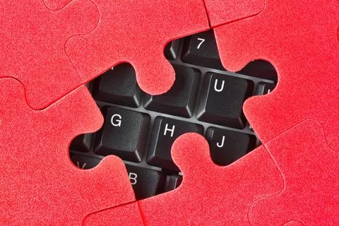Puzzle and computer keyboard Puzzle and computer keyboard - technology bac... Stock Photos
