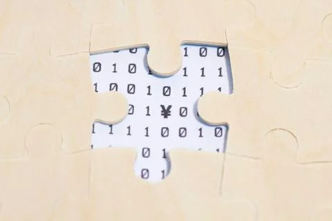 Puzzle and RMB code, teamwork, information encryption Foto stock