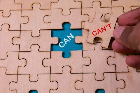 Puzzle can can’t Stock Photos