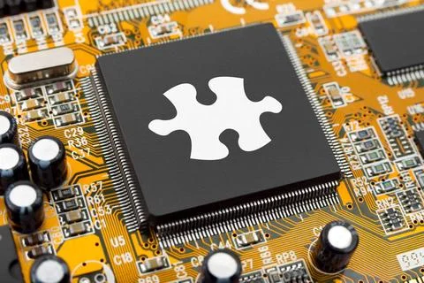 Puzzle on computer chip Puzzle on computer chip - technology background Co... Stock Photos