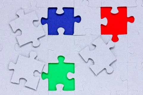 Puzzle with different colored pieces Stock Photos