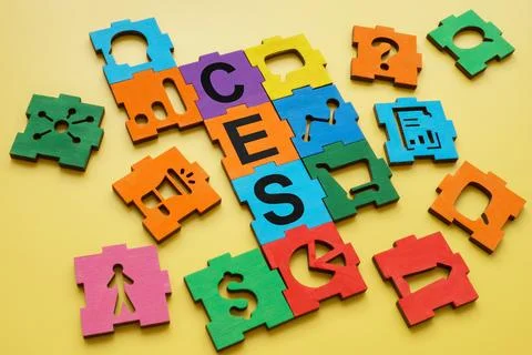 Puzzle elements with abbreviation CES Customer Effort Score. Stock Photos