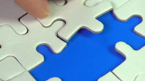 Puzzle elements create whole jigsaw and later disintegrate in space. Animation Stock Footage 336248600