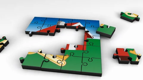 Puzzle forming a house with a key Stock Footage 38739646
