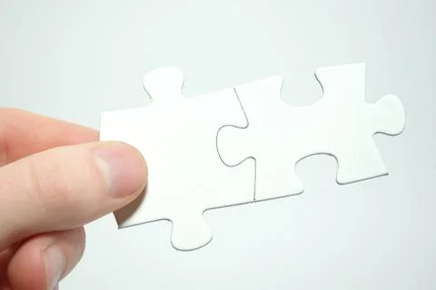 Puzzle in hand Stock Photos
