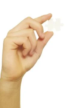 Puzzle in hand Stock Photos