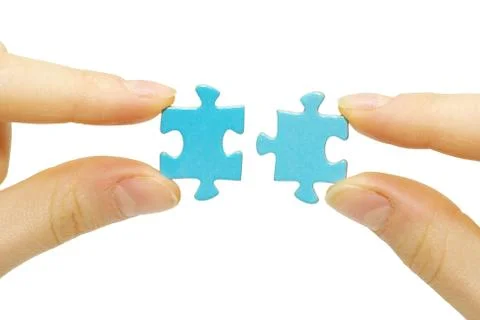Puzzle in hand Stock-Fotos