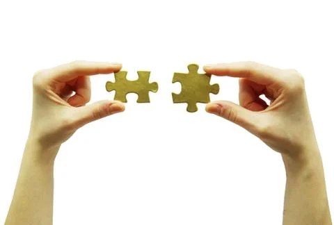 Puzzle in hands Foto stock