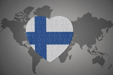 Puzzle heart with the national flag of finland on a world map background. Stock Illustration