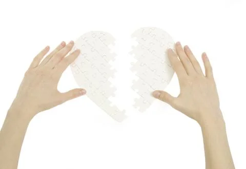 Puzzle heart Stock Photos