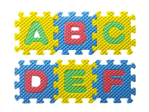 Puzzle letters Stock Photos