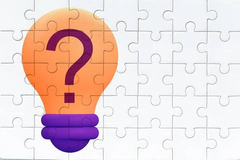  Puzzle with a lightbulb and question mark, symbolizing ideas and problem-... Stock Photos