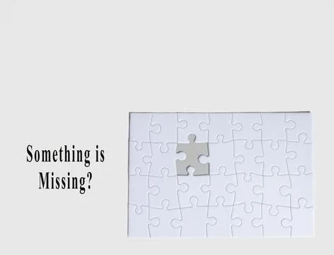 Puzzle With One Missing Piece on a Plain Background Raises Questions About .. Stock Photos