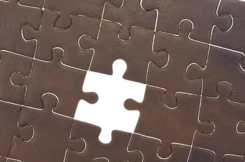 Puzzle with one piece missing Stock Photos