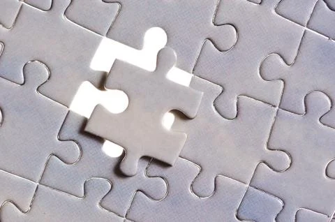 Puzzle with one piece missing Stock Photos