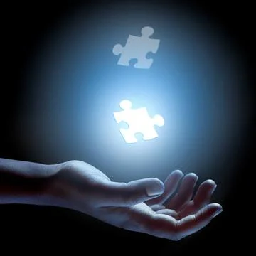 Puzzle, piece and abstract solution in hand for problem solving, challenge and Stock Photos