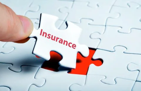 Puzzle piece coming down into it's place Stock Photos