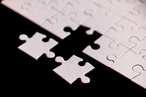 A puzzle piece is missing from a puzzle Foto stock