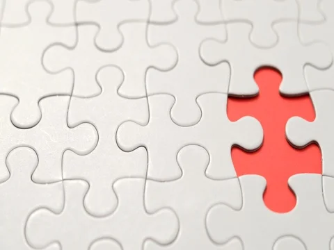 Puzzle piece put into missing places Stock Footage 79526906