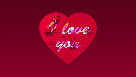 Puzzle pieces falling down, heart shape and text I love you. Valentine's Day Stock Footage 144845489