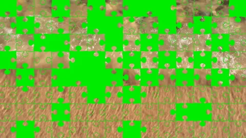 Puzzle Pieces Makes  Waves on  Beach Video stock 150958697