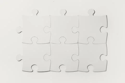 Puzzle pieces on white background Stock Photos