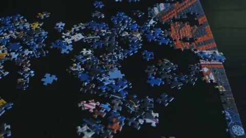 Puzzle in progress on a table 動画素材 91774122