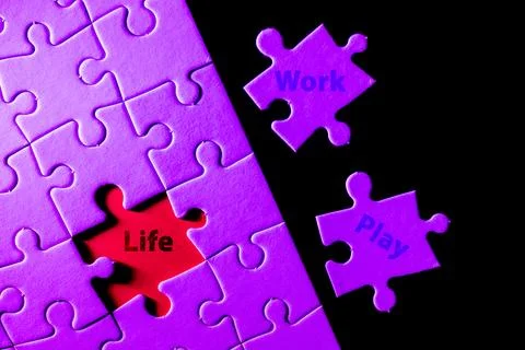 A puzzle with a red piece missing and the words "Life Work Play" written on it Stock Photos