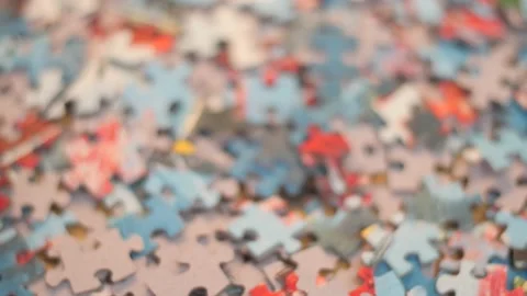 Puzzle Shapes Moving into Focus Stock Footage 148539123