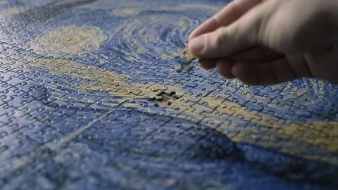 Puzzle solved. placing the last piece of the puzzle. Jigsaw puzzle solved. Stock Footage 128434762