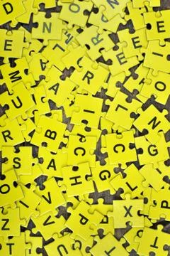 Puzzle on wooden table Photos