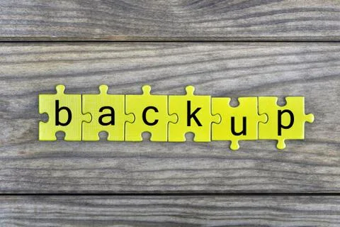 Puzzle with word Backup Stock Photos