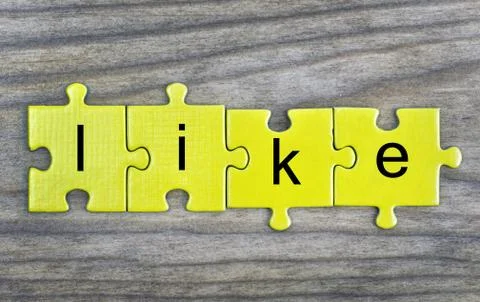 Puzzle with word Like Stock Photos