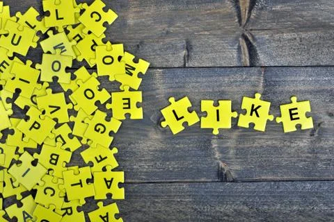 Puzzle with word Like Stock Photos