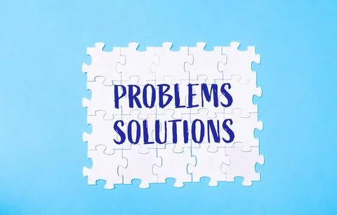 A puzzle with the word problems written on it 스톡 사진