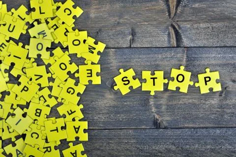 Puzzle with word Stop Stock Photos